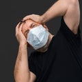 Sick old man in medical mask