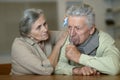 Portrait of sick senior man holding inhaler Royalty Free Stock Photo