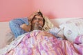 Man with flu into bed Royalty Free Stock Photo