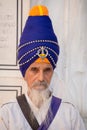 Portrait Sikh man in Golden Temple, Amritsar, Punjab, India. Close up