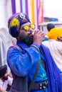 Portrait of sikh people with colorful turban and colours of face during hola mohalla