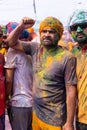 Portrait of sikh people with colorful turban and colours of face during hola mohalla