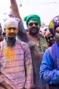 Portrait of sikh people with colorful turban and colours of face during hola mohalla