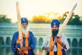 Portrait of Sikh Warriors protectors of innocents holding swords in hands at sunset sunrise outdoor Royalty Free Stock Photo