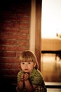 Portrait of sitting a boy with worried look Royalty Free Stock Photo