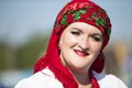 Portrait of a Slavic elderly woman in national ethnic dress. Ukrainian or Belarusian woman