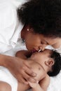 Portrait of sleeping african american baby girl with mother