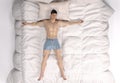 3D Render : The portrait of sleeping male character in the big white bed