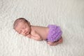 Slleeping Newborn Baby Girl Wearing Purple Bloomers