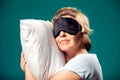 A portrait of sleeping woman with sleep mask on head. Relaxing time Royalty Free Stock Photo