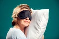 A portrait of sleeping woman with sleep mask on head. Relaxing time Royalty Free Stock Photo