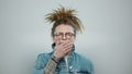 Sleepy man yawning in studio. Tired guy posing on grey background Royalty Free Stock Photo