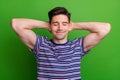 Portrait of sleepy peaceful man with bristle wear stylish t-shirt eyes closed arms behind head take nap isolated on Royalty Free Stock Photo