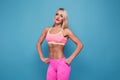 Portrait of slim sporty Blonde bodybuilder. VERY HOT woman stand