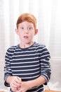 Portrait small boy scared with eyes wide open Royalty Free Stock Photo