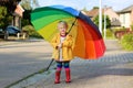 Portrait of small preschooler girl with colorful umbrella Royalty Free Stock Photo