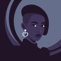Portrait of a smart African woman in half-turn with the earring.