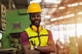 Portrait smart Black African worker work in heavy industry factory with safety clothes equipments