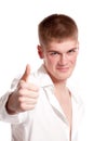Portrait of a smart guy showing thumbs up Royalty Free Stock Photo