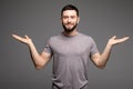 Portrait of a smart serious young man in casual clothes standing Royalty Free Stock Photo