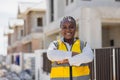 Portrait smart success black women worker african female work in construction industry happy smile in construction site Royalty Free Stock Photo