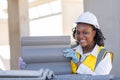 Portrait smart success black women worker african female work in construction industry happy smile in construction site Royalty Free Stock Photo