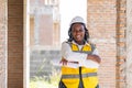 Portrait smart success black women worker african female work in construction industry happy smile in construction site Royalty Free Stock Photo