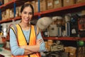 Portrait smart woman worker Asian girl teen work in warehouse factory inventory manager confident happy smiling Royalty Free Stock Photo