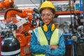 Portrait smart woman worker Black African teen girl happy smiling in modern factory Royalty Free Stock Photo