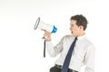Portrait of smart young asian businessman wearing white shirt shout with wireless speaker megaphone on isolated white background