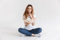 Portrait of a smart young girl holding book Royalty Free Stock Photo