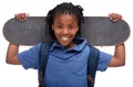 Portrait, smile and african boy skater in studio isolated on white background for sports or leisure. Kids, happy or Royalty Free Stock Photo