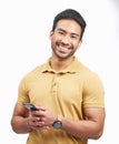 Portrait, smile and Asian man with a smartphone, connection and social media against a white studio background. Person Royalty Free Stock Photo