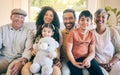 Portrait, smile and big family in home living room, bonding and having fun together. Happy, children and grandparents Royalty Free Stock Photo