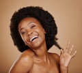 Portrait, smile and black woman pulling hair, growth and wellness against a brown studio background. Face, female person Royalty Free Stock Photo