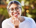 Portrait, smile and blowing a kiss with a woman on a nature green background for love or romance. Face, glasses and Royalty Free Stock Photo