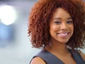 Portrait, smile and business woman at office for career or job in South Africa with bokeh at startup. Face, happy Royalty Free Stock Photo