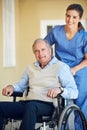 Portrait smile, caregiver or old man in wheelchair in hospital clinic helping an elderly patient for trust or support Royalty Free Stock Photo