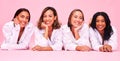 Portrait, smile and lingerie with woman friends on a pink background in studio for natural skincare. Diversity, beauty Royalty Free Stock Photo