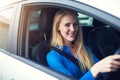 Portrait, smile and woman driving car for travel, journey and transportation. Face, happy and female person in vehicle Royalty Free Stock Photo