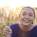 Portrait smile young girl at field gass Royalty Free Stock Photo