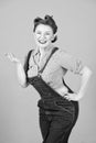 Portrait of smiled and cheerful pin-up girl standing with hand Royalty Free Stock Photo