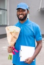 portrait of smiling african american delivery man Royalty Free Stock Photo
