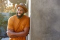 Portrait Of Smiling African American Man Wearing Hat In Garden At Home Royalty Free Stock Photo