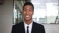 Portrait of Smiling Afro-American Businessman in Suit Looking in Camera Royalty Free Stock Photo