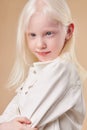 Portrait of smiling albino child 