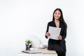 Portrait of Smiling asian happy business woman with working in office and looking at the camera Royalty Free Stock Photo