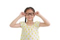 Portrait of smiling asian little girl child wearing glasses isolated on white background Royalty Free Stock Photo