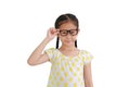 Portrait of smiling asian little girl child wearing glasses isolated on white background Royalty Free Stock Photo