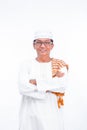 Portrait of smiling asian muslim old man wear white clothes welcoming you isolated over whit Royalty Free Stock Photo